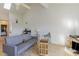 Living room with gray couch and wood floors at 1880 Colony Dr. # 12-H, Surfside Beach, SC 29575