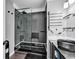 Modern bathroom with a large glass shower, black fixtures, and double vanity at 1900 Shell Ct., Myrtle Beach, SC 29575