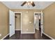 Bright bedroom with ceiling fan and access to closets and bathroom at 1900 Shell Ct., Myrtle Beach, SC 29575