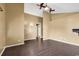 Bright living room with hardwood floors and wall sconces at 1900 Shell Ct., Surfside Beach, SC 29575