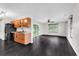 Open concept living area features wood floors and lots of natural light at 1900 Shell Ct., Surfside Beach, SC 29575