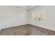Bright bedroom with hardwood floors and window shutters at 192 Sea Shell Dr. # 22, Murrells Inlet, SC 29576