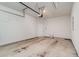 Garage with overhead storage and door to outside at 192 Sea Shell Dr. # 22, Murrells Inlet, SC 29576
