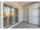 Screened porch with sliding glass doors and storage closet at 192 Sea Shell Dr. # 22, Murrells Inlet, SC 29576