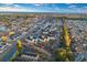Expansive aerial shot of a community featuring condos, winding waterways, and vibrant coastal scenery at 2060 Cross Gate Blvd. # 204, Surfside Beach, SC 29575
