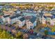 Aerial view of community featuring ponds, mature trees, and resident parking at 2060 Cross Gate Blvd. # 204, Surfside Beach, SC 29575