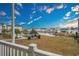 Beautiful view from balcony showcasing pool, lake, and neighborhood at 2060 Cross Gate Blvd. # 204, Surfside Beach, SC 29575
