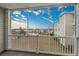 Serene balcony view overlooking a pond and neighboring houses at 2060 Cross Gate Blvd. # 204, Surfside Beach, SC 29575