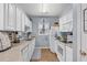 Functional kitchen with white appliances and plentiful counter space at 2060 Cross Gate Blvd. # 204, Surfside Beach, SC 29575