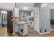 Bright kitchenette with white cabinetry and a cute breakfast bar at 2060 Cross Gate Blvd. # 204, Surfside Beach, SC 29575