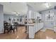 Open-concept living area combines kitchen, dining, and living room with hardwood floors at 2060 Cross Gate Blvd. # 204, Surfside Beach, SC 29575