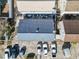 Aerial view of home and parking, showcasing roof and yard at 2402 Hillside Dr. S, North Myrtle Beach, SC 29582