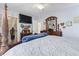 Main bedroom with a king-size bed and a built-in TV at 2402 Hillside Dr. S, North Myrtle Beach, SC 29582