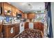 Well-equipped kitchen with ample cabinetry and granite countertops at 2402 Hillside Dr. S, North Myrtle Beach, SC 29582