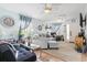 Spacious living room with light blue walls and ample seating at 2402 Hillside Dr. S, North Myrtle Beach, SC 29582