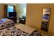 Inviting bedroom featuring two beds, a dresser, and comfortable seating area at 2504 Ocean Blvd. N # 232, Myrtle Beach, SC 29577