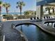 Outdoor hot tub overlooking the beach with lounge chairs for relaxation in a serene setting at 2504 Ocean Blvd. N # 232, Myrtle Beach, SC 29577