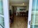 Bright and airy living space featuring a dining table and a view into the kitchen area at 2504 Ocean Blvd. N # 232, Myrtle Beach, SC 29577