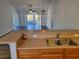 Kitchen with breakfast bar overlooking a living room with water views at 2543 Whetstone Ln., Myrtle Beach, SC 29579