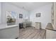 Bright home office with built-in shelving and hardwood floors at 2659 Blue Crane Circle, Myrtle Beach, SC 29577