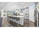 Spacious kitchen with granite island, stainless steel appliances, and light blue cabinets at 2659 Blue Crane Circle, Myrtle Beach, SC 29577
