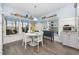 Bright kitchen nook with white table and chairs, and built-in shelving at 2659 Blue Crane Circle, Myrtle Beach, SC 29577