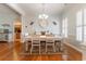 Formal dining room with hardwood floors, a large table, and elegant chandelier at 29 Saltwind Loop, Murrells Inlet, SC 29576