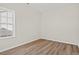 Carpetless bedroom with a large window at 391 Lifestyle Court, Surfside Beach, SC 29575