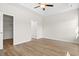 Bright bedroom with a trey ceiling, walk-in closet and wood-look flooring at 391 Lifestyle Court, Surfside Beach, SC 29575
