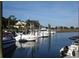 Well-maintained boat dock featuring several boats on the water with clear skies above at 391 Lifestyle Court, Surfside Beach, SC 29575