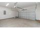 Attached two-car garage with automatic opener and smooth concrete floor at 396 Lifestyle Court, Surfside Beach, SC 29575