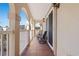 Private balcony with outdoor seating and partial ocean view at 400 Hillside Dr. N # 302C, North Myrtle Beach, SC 29582