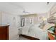 Spacious bedroom with a king-size bed and access to a balcony at 400 Hillside Dr. N # 302C, North Myrtle Beach, SC 29582