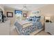 Bedroom with a queen bed and coastal-themed decor at 400 Hillside Dr. N # 302C, North Myrtle Beach, SC 29582