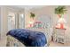 Cozy bedroom with a queen-size bed and en-suite bathroom at 400 Hillside Dr. N # 302C, North Myrtle Beach, SC 29582