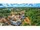 Property aerial showing community amenities, golf course, and mature trees at 4382 Saint Annes Ct., Myrtle Beach, SC 29579