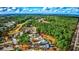 Aerial view highlighting home's location near golf course and green spaces at 4382 Saint Annes Ct., Myrtle Beach, SC 29579