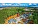 Beautiful aerial view of the house with surrounding trees and neighborhood at 4382 Saint Annes Ct., Myrtle Beach, SC 29579