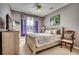 Bedroom with neutral walls, a window with curtains, a ceiling fan, and traditional furniture at 4382 Saint Annes Ct., Myrtle Beach, SC 29579