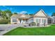 Charming single-story home with manicured lawn and welcoming front porch seating at 4382 Saint Annes Ct., Myrtle Beach, SC 29579