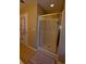 Modern bathroom featuring a glass shower enclosure and neutral tile flooring at 4657 Fringetree Dr. # C, Murrells Inlet, SC 29576
