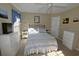 Comfortable bedroom featuring neutral walls, ceiling fan, and carpeted floors at 4657 Fringetree Dr. # C, Murrells Inlet, SC 29576