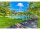 Well-maintained tennis courts with surrounding greenery at 4657 Fringetree Dr. # C, Murrells Inlet, SC 29576