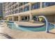 Lazy river pool with colorful water features for  at 4800 S Ocean Blvd. # 312, North Myrtle Beach, SC 29582