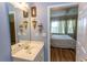 Bathroom with single sink vanity and access to bedroom at 5801 Oyster Catcher Dr. # 1624, North Myrtle Beach, SC 29582