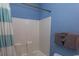 Clean bathroom with shower/tub combo and blue walls at 5801 Oyster Catcher Dr. # 1624, North Myrtle Beach, SC 29582
