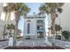 Beach club entrance with parking and palm trees at 5801 Oyster Catcher Dr. # 1624, North Myrtle Beach, SC 29582
