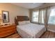 Spacious bedroom with a king-size bed and plenty of natural light at 5801 Oyster Catcher Dr. # 1624, North Myrtle Beach, SC 29582