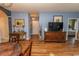 Charming dining area with hardwood floors and elegant wooden table at 5801 Oyster Catcher Dr. # 1624, North Myrtle Beach, SC 29582