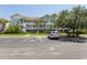 Two-story condo building with balconies and ample parking at 5801 Oyster Catcher Dr. # 1624, North Myrtle Beach, SC 29582
